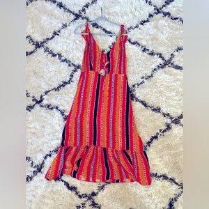 Colorful midi dress with tie front detail.